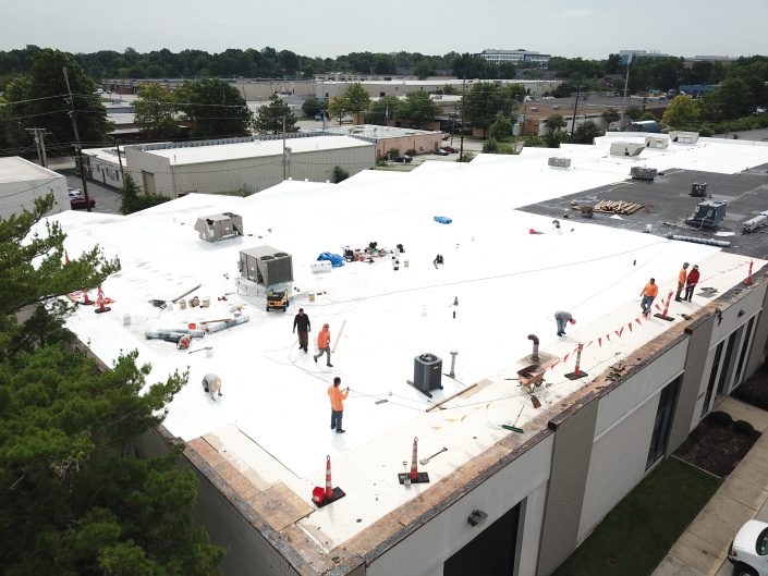 40,000 sq ft commercial low slope TPO recover application in St. Louis, 1st Choice Roofing & Construction