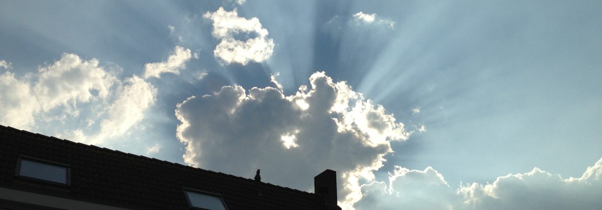 ray of sun over roof
